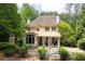 Stunning backyard with pool, patio, outdoor grill, and covered porch perfect for entertaining at 4101 Rickenbacker Ne Dr, Atlanta, GA 30342