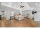 Spacious bedroom with hardwood floors, tray ceilings, ceiling fan, and ensuite bathroom at 4101 Rickenbacker Ne Dr, Atlanta, GA 30342