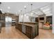 Spacious kitchen island with stainless steel appliances and a view of the cozy living area at 4101 Rickenbacker Ne Dr, Atlanta, GA 30342