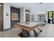 Inviting game room with pool table, Connect Four, and comfortable seating for residents' enjoyment at 775 Juniper Ne St # 334, Atlanta, GA 30308