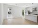 Bright living room and kitchen area with stainless steel appliances at 775 Juniper Ne St # 334, Atlanta, GA 30308