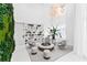Modern lobby with a comfortable seating area, built-in bookshelves, and a vibrant green wall at 775 Juniper Ne St # 334, Atlanta, GA 30308