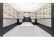 Bright mailroom with bird-themed wallpaper, modern lighting, and rows of mailboxes for tenant convenience at 775 Juniper Ne St # 334, Atlanta, GA 30308