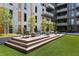 Inviting outdoor deck with seating, lush greenery, and a tranquil atmosphere for relaxation at 775 Juniper Ne St # 334, Atlanta, GA 30308