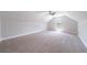 Spacious bedroom featuring neutral walls, carpet, and a ceiling fan at 1480 Holly Brook Rd, Snellville, GA 30078