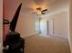 Bedroom featuring ceiling fan and window providing ample light at 1777 Weatherbrook Cir, Lawrenceville, GA 30043