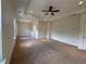 Large main bedroom features tray ceiling, recessed lighting and large windows at 1777 Weatherbrook Cir, Lawrenceville, GA 30043