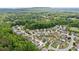 An aerial view of the neighborhood, highlighting its winding streets and green spaces with the property in focus at 3365 Buffington Ln, Cumming, GA 30040