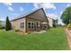 Spacious backyard features a patio and well-manicured lawn at 3365 Buffington Ln, Cumming, GA 30040