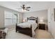 Bedroom with a bed, nightstands, and a window for natural light at 3365 Buffington Ln, Cumming, GA 30040