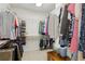 Walk-in closet with plenty of hanging storage and shelving for organization at 3365 Buffington Ln, Cumming, GA 30040