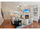 Cozy living room with fireplace, vaulted ceilings, and built-in shelving at 3365 Buffington Ln, Cumming, GA 30040