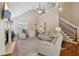 Spacious living room with fireplace, vaulted ceilings, and hardwood floors at 3365 Buffington Ln, Cumming, GA 30040