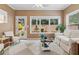 Inviting sunroom with large windows and natural light at 3365 Buffington Ln, Cumming, GA 30040