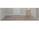 Bedroom featuring carpeted floors, a doorway, and neutral colored walls at 3399 Lake Frg, Fairburn, GA 30213