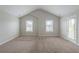 A spacious bedroom features two windows and door to private balcony offering ample natural light at 3399 Lake Frg, Fairburn, GA 30213