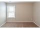 Bright, naturally lit bedroom with neutral carpet and paint at 3399 Lake Frg, Fairburn, GA 30213