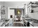 Modern kitchen featuring stainless steel appliances, gas range, and marble countertops at 4568 Oswood Ct, Tucker, GA 30084