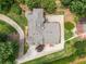 Aerial view showing the home's layout, driveway, and surrounding greenery at 5102 Chastleton Dr, Stone Mountain, GA 30087
