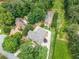 Expansive estate with a tennis court, pool, lush greenery, and well-maintained landscaping at 5102 Chastleton Dr, Stone Mountain, GA 30087