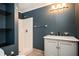 Cozy bathroom with walk-in shower and marble topped vanity at 5102 Chastleton Dr, Stone Mountain, GA 30087