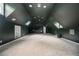 Large bonus room with dark green walls and multiple windows at 5102 Chastleton Dr, Stone Mountain, GA 30087