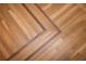 Detailed view of hardwood floors laid in a herringbone pattern at 5102 Chastleton Dr, Stone Mountain, GA 30087
