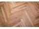 Close-up showcasing elegant hardwood floors in a herringbone pattern at 5102 Chastleton Dr, Stone Mountain, GA 30087