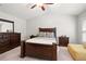 Cozy bedroom with ample storage, natural light, and stylish furnishings at 5880 Crestwick Way, Cumming, GA 30040