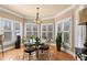 Breakfast nook features natural light, and a charming dining table with seating for four at 2502 Oak Hill Ovlk, Duluth, GA 30097
