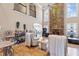 Stunning living room featuring a stone fireplace, vaulted ceiling, and an open layout with great natural light at 2502 Oak Hill Ovlk, Duluth, GA 30097