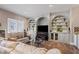 Comfortable living room with custom built-ins, great lighting, and a stylish seating area at 2502 Oak Hill Ovlk, Duluth, GA 30097