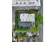 Aerial view of the building, parking and pool within a neighborhood of similar multi-Gathering units at 395 Pharr Ne Rd # 103, Atlanta, GA 30305