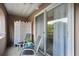 Cozy outdoor seating on balcony for relaxing and enjoying the view at 395 Pharr Ne Rd # 103, Atlanta, GA 30305