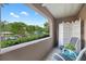 Relaxing balcony offers a view of trees and outdoor greenery at 395 Pharr Ne Rd # 103, Atlanta, GA 30305