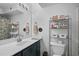 Well-maintained bathroom with decorative shelves and towel racks at 395 Pharr Ne Rd # 103, Atlanta, GA 30305