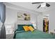 Comfortable bedroom with a neutral color scheme, closet, and decorative art at 395 Pharr Ne Rd # 103, Atlanta, GA 30305