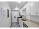 Bright kitchen featuring stainless steel appliances and granite countertops at 395 Pharr Ne Rd # 103, Atlanta, GA 30305