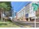Street view of condominium building in vibrant neighborhood, close to shops and restaurants at 395 Pharr Ne Rd # 103, Atlanta, GA 30305