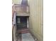 View of a home's recessed and covered entryway with wood deck, railings, and concrete walk at 5818 Par Four Ct, Lithonia, GA 30038