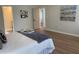 This bedroom features wood floors and neutral paint at 219 Maple Creek, Woodstock, GA 30188