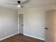 This is an unfurnished bedroom with wood floors and neutral paint at 219 Maple Creek, Woodstock, GA 30188
