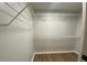 This closet is spacious and features wood floors and wire shelving at 219 Maple Creek, Woodstock, GA 30188