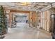 Unfinished basement space with exposed beams and insulation, offering potential for customization and additional living space at 3341 Anna Ruby Ln, Buford, GA 30519