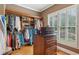 Walk-in closet with custom shelves and drawers, offering ample storage space and organization at 3341 Anna Ruby Ln, Buford, GA 30519