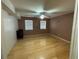 Bedroom featuring gleaming hardwood floors and plenty of natural light at 3709 Charlotte Dr, Rex, GA 30273