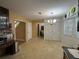 Open dining area with storage and natural light at 3709 Charlotte Dr, Rex, GA 30273