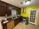 Well-lit kitchen featuring stainless steel appliances and tile backsplash at 3709 Charlotte Dr, Rex, GA 30273