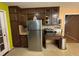 Functional kitchen with dark cabinetry and ample counter space at 3709 Charlotte Dr, Rex, GA 30273