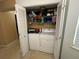 Convenient laundry closet with washer and dryer at 3709 Charlotte Dr, Rex, GA 30273